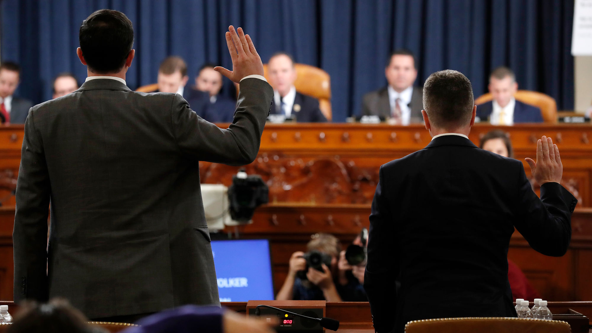 Ambassador Kurt Volker, right, former special envoy to Ukraine, and Tim Morrison, a former official at the National Security Council are sworn in to testify before the House Intelligence Committee on Capitol Hill in Washington.