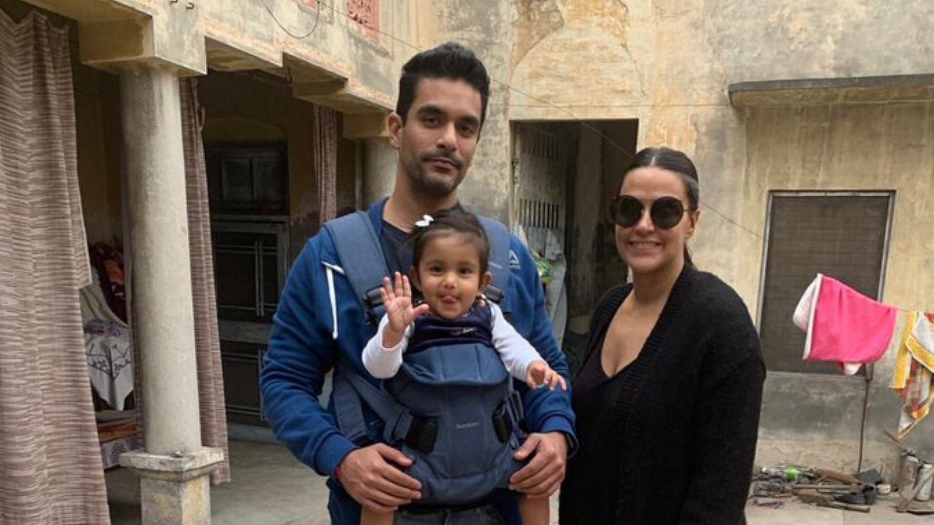 Angad Bedi and Neha Dhupia with their daughter Mehr.&nbsp;