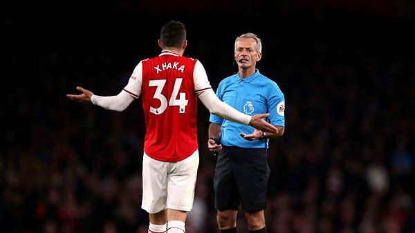 Granit Xhaka threw the captains’ armband and tore his jersey after being substituted in Arsenal’s 2-2 draw against Crystal Palace.