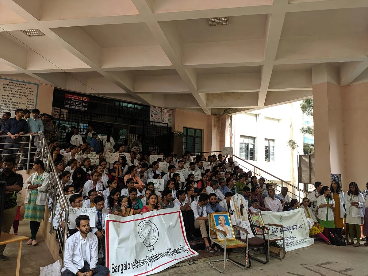 Scores of post graduate residents of Victoria Hospital sat in protest against the alleged harassment of a junior doctor at Minto Eye Hospital last week, demanding more stringent security measures.