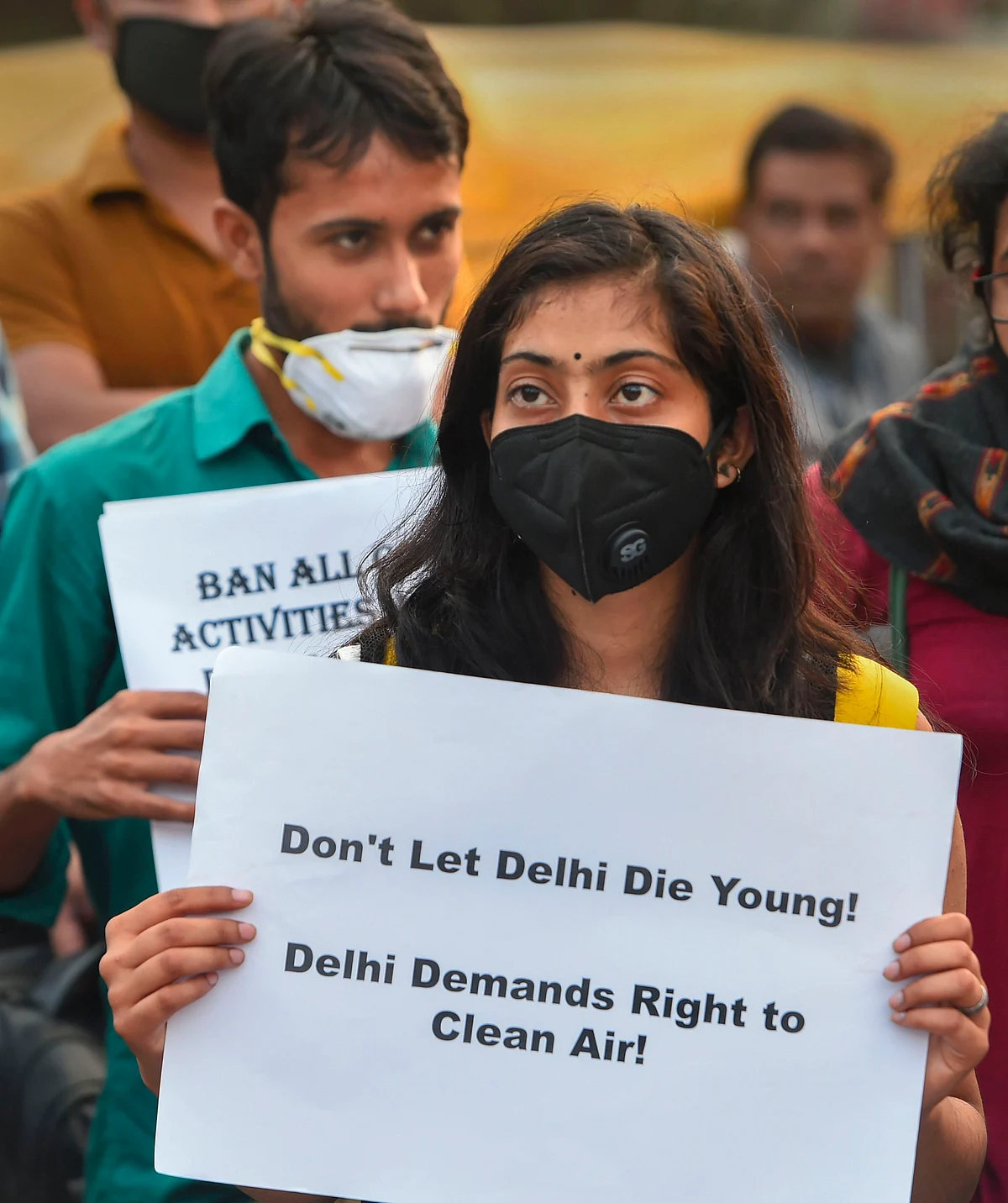 Students demand immediate steps to control air pollution at CP’s Central Park, in New Delhi. 