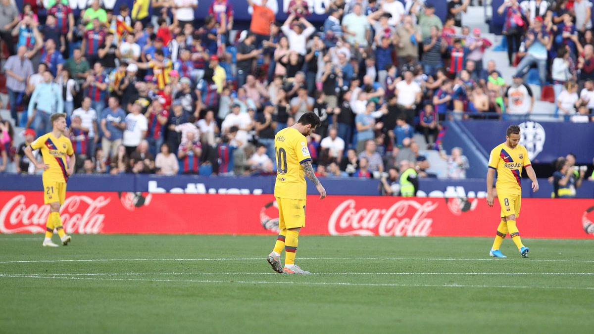 Barcelona were humbled 3-1 by a resilient Levante, who ended an eight-game winning streak for the Catalan club.