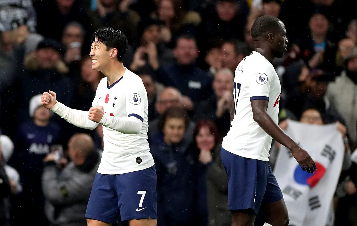 Tottenham Hotspur’s Son Heung-min, left, celebrates scoring his side’s first goal of the game, during the English Premier League match between Tottenham Hotspur and Sheffield United, at Tottenham Hotspur Stadium.