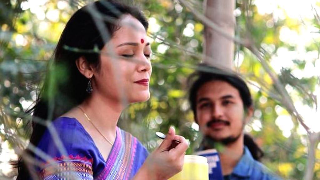 Limar Das and Arghadeep Baruah in a still from <i>Aamis</i>.