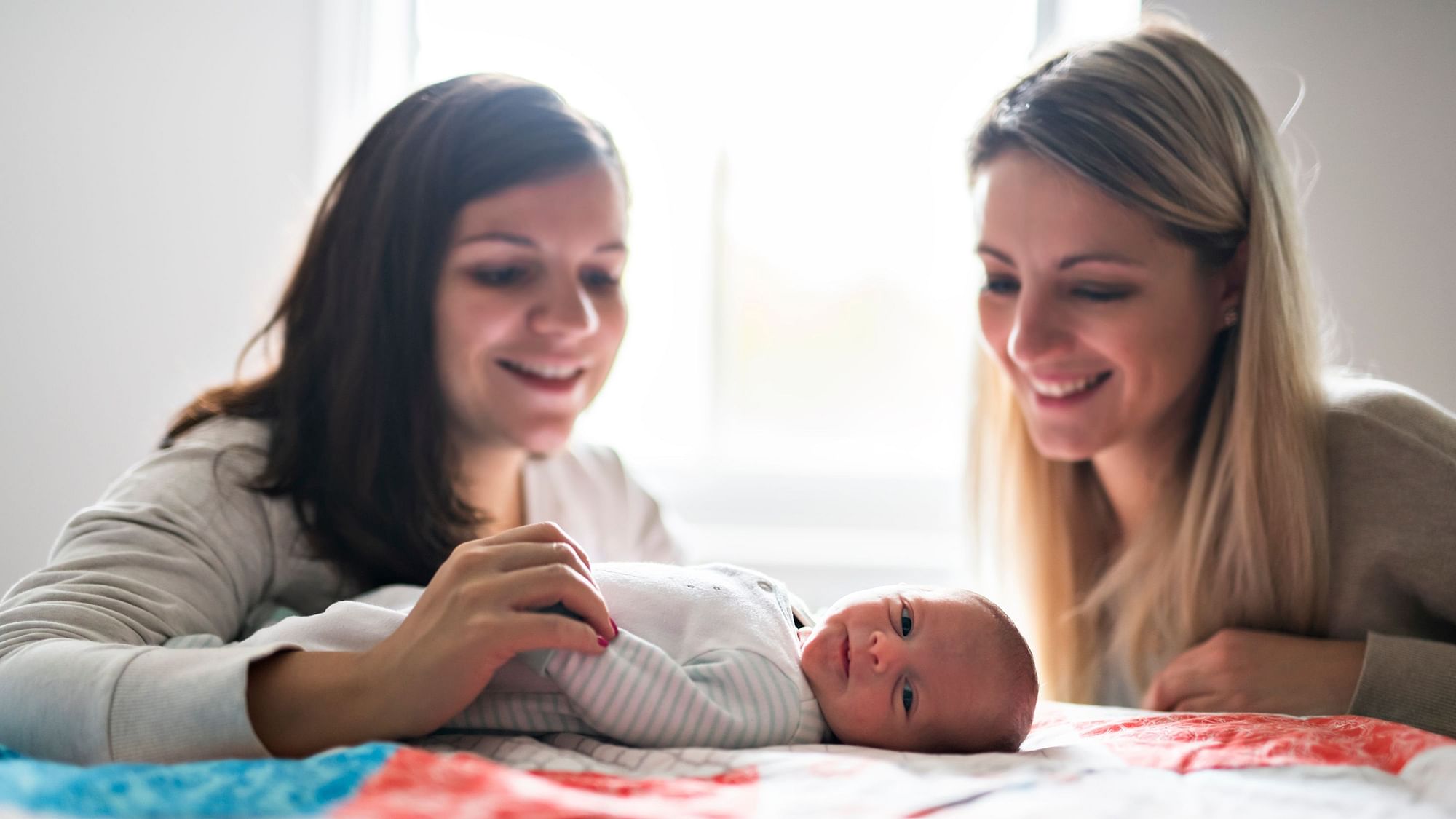 A lesbian couple in UK started their journey as parents with the new shared motherhood technique.