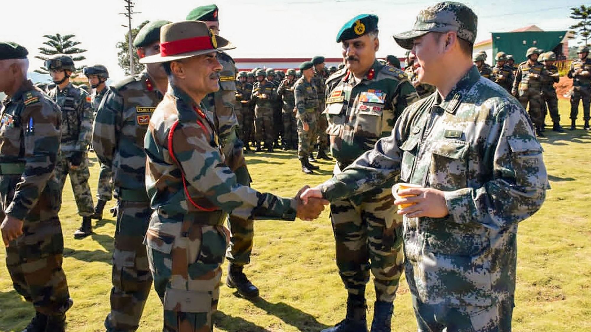 Indian Army and People’s Liberations Army (PLA) officials shake hands on the opening day of the India- China joint exercise - Hand-in-Hand 2019, at the Joint Training Node (JTN), Umroi in Meghalaya.
