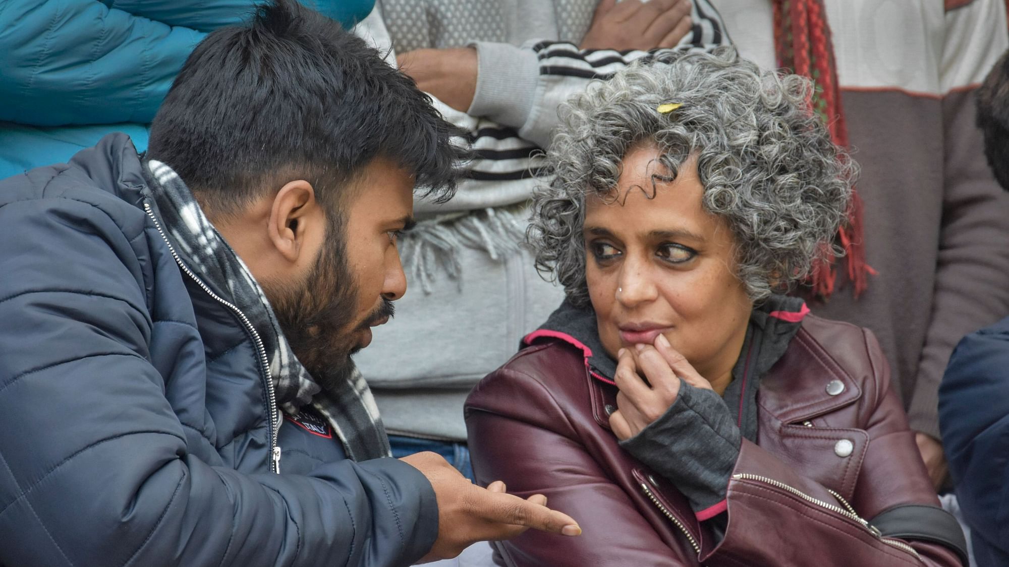 Noted writer-activist Arundhati Roy with Fahad Ahmed, a student at the Tata Institute of Social Science (TISS), during a protest against the amnended Citizenship Act at Delhi University campus in New Delhi.