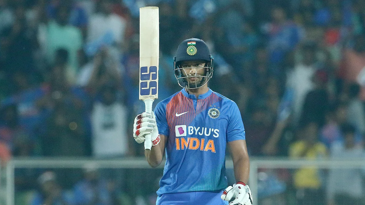 Shivam Dube raises his bat after scoring a fifty during the second T20I match against the West Indies held at the Greenfield Stadium, Thiruvananthapuram.