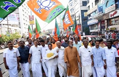 Kochi:  Union Minister Alphons Kannanthanam and BJP workers celebrate as the party led by Prime Minister Narendra Modi was set to retain power for another five years after making a sweep of the Lok Sabha battle and mauling the opposition; in Kochi, Kerala on May 23, 2019. (Photo: IANS)