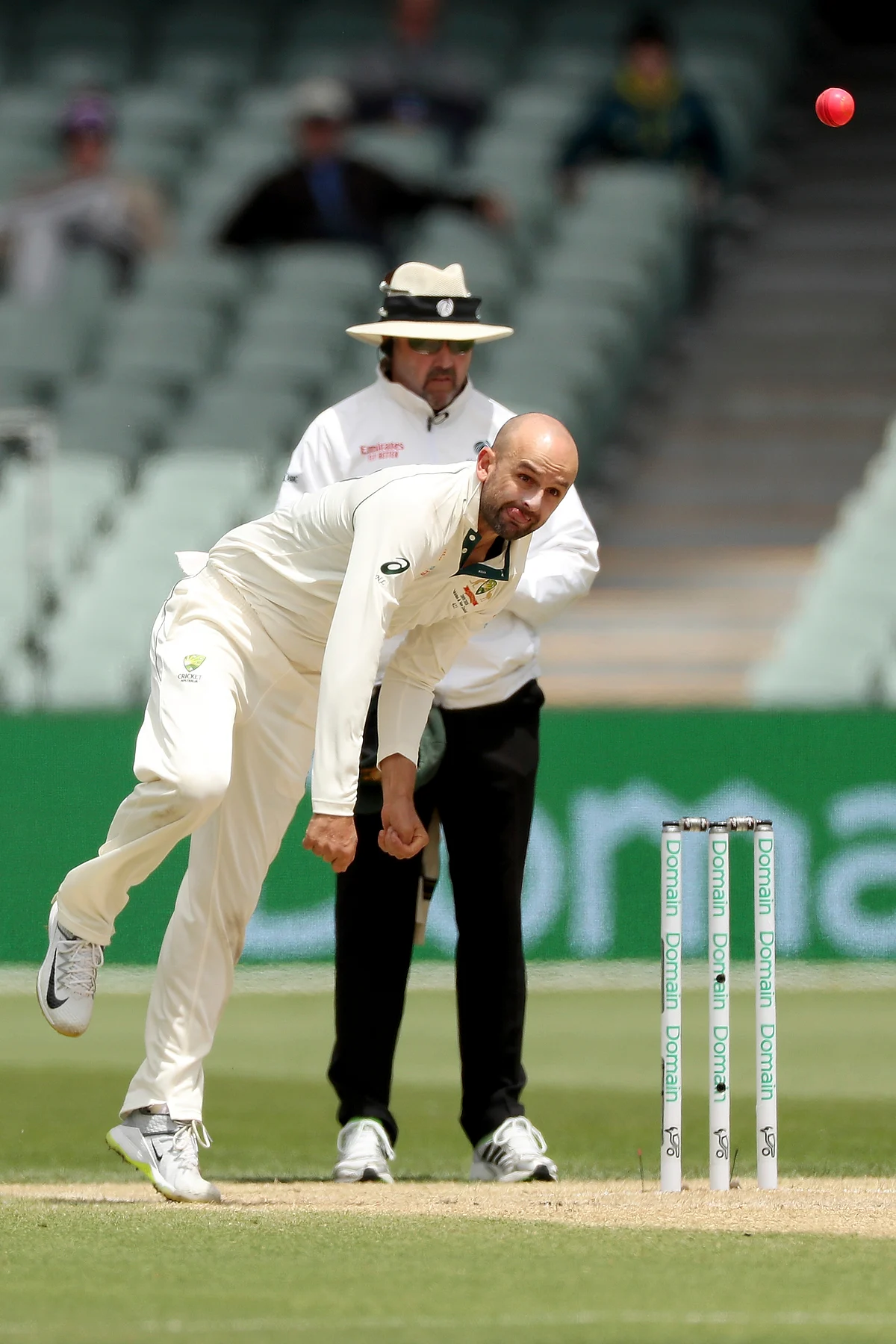 Australia’s Nathan Lyon bowls during their cricket Test match against Pakistan in Adelaide.