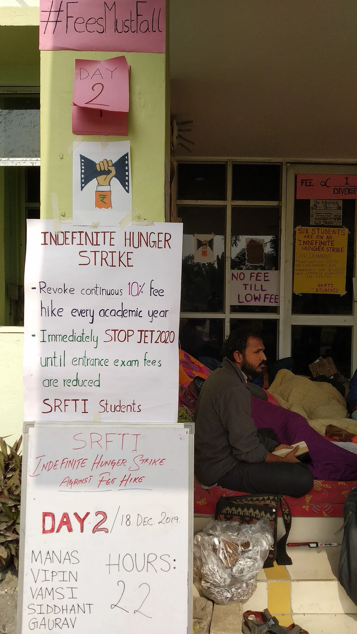 Posters plastered on a building in the SRFTI campus. 