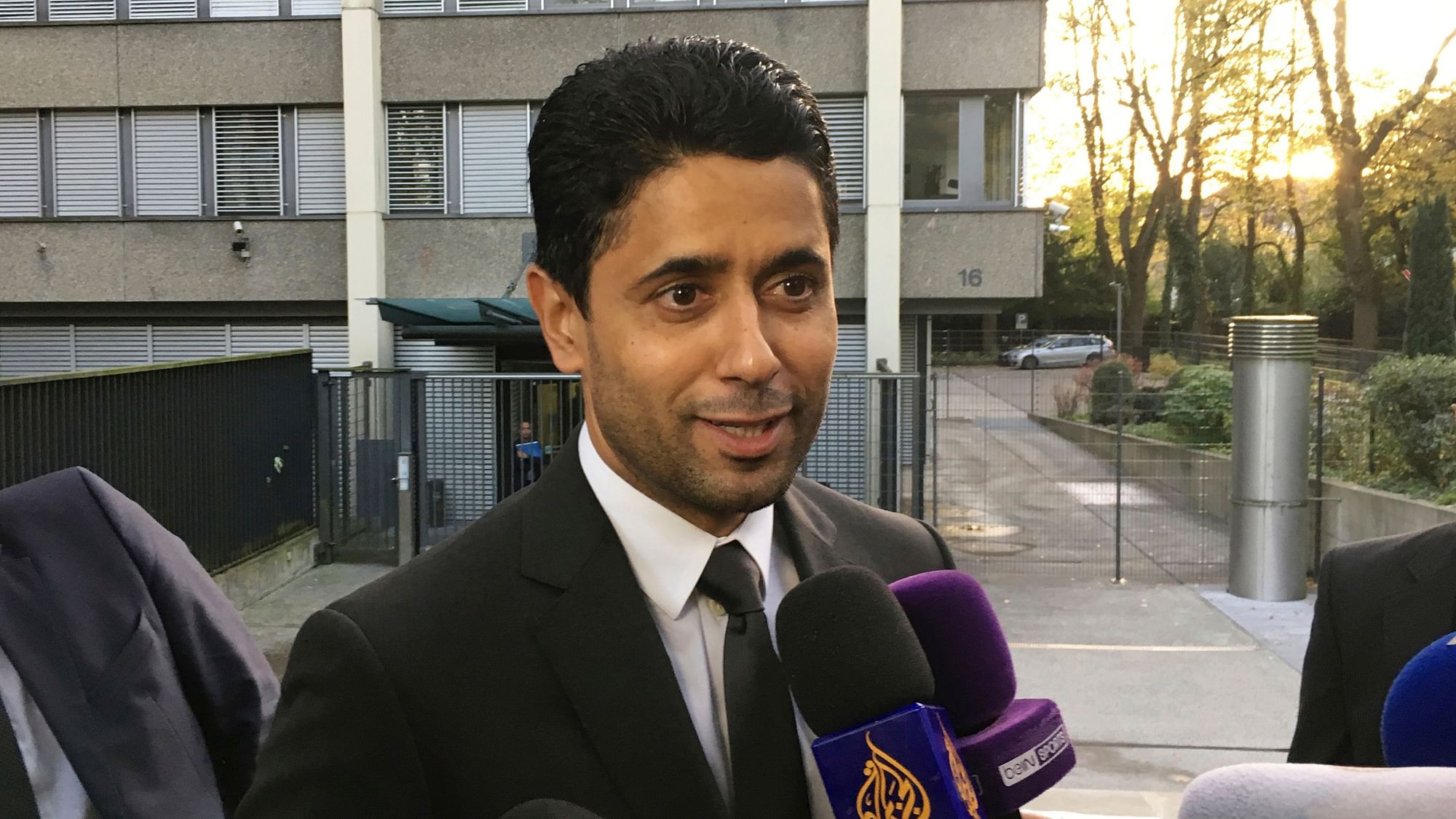 In this Wednesday Oct. 25, 2017 file photo, Paris Saint-Germain president Nasser Al-Khelaifi speaks to the media after a meeting with Swiss prosecutors in Bern, Switzerland.