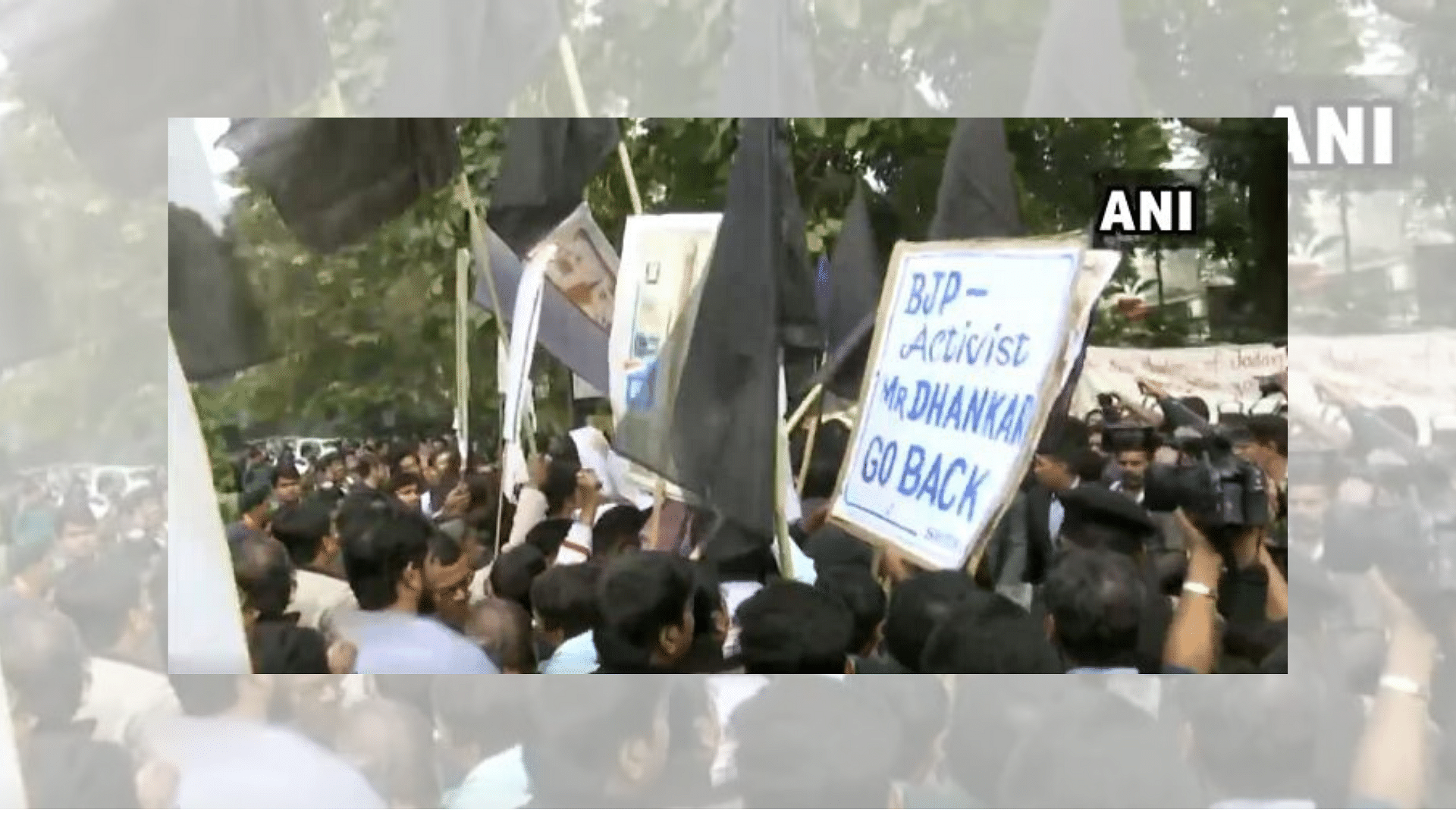 Jadavpur University students held placards with ‘BJP Activist Mr Dhankar Go Back.’