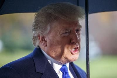 WASHINGTON, Dec. 2, 2019 (Xinhua) -- U.S. President Donald Trump speaks to reporters before leaving the White House in Washington D.C., the United States, on Dec. 2, 2019. U.S. President Donald Trump slammed an ongoing impeachment inquiry into him on Monday, as the next phase of the high-stake investigation was drawing near. (Photo by Ting Shen/Xinhua/IANS)
