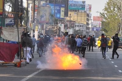 Guwahati: Angry protestants go on rampage while protesting against the Citizenship (Amendment) Bill 2019 that was tabled in the Rajya Sabha today, demanding unconditional withdrawal of the contentious bill, in Guwahati on Dec 11, 2019. The protesters tried to march towards the state secretariat and burnt tyres on the roads, creating a volatile situation, as the police tried to control the unrest by firing rubber bullets and lobbing tear gas shells. Incidents of violence were reported from variou
