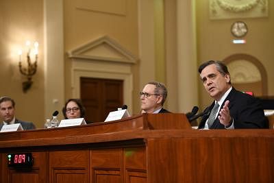 WASHINGTON, Dec. 4, 2019 (Xinhua) -- Jonathan Turley (1st R), professor of public interest law at the George Washington University Law School, testifies before the U.S. House Judiciary Committee on Capitol Hill in Washington D.C., the United States, on Dec. 4, 2019. The Democrat-led House Judiciary Committee took over a months-long impeachment proceeding into U.S. President Donald Trump by holding its first hearing on Wednesday. (Xinhua/Liu Jie/IANS)