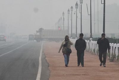 New Delhi: People wear layers of cloths on a cold winter morning in New Delhi, on  Feb 2, 2019. (Photo: IANS)