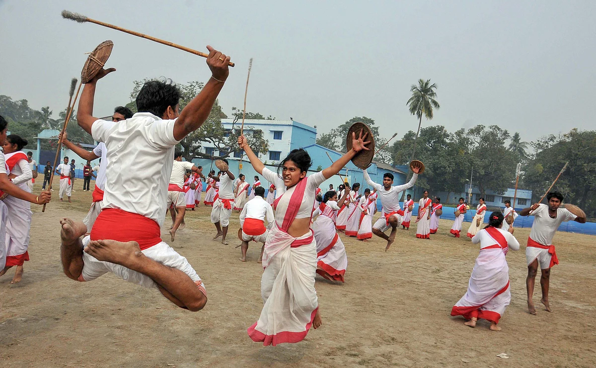 Partcipants from West Bengal and Bangladesh practise martial arts during the 60th All Bengal Bratachari Training Camp in Kolkata on Thursday,26 December.