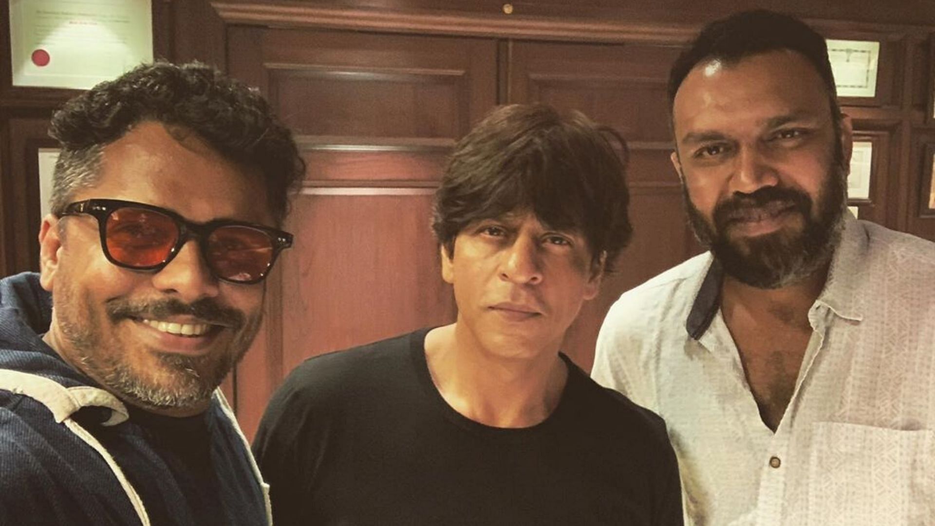 Shah Rukh Khan with director Aashiq Abu and Syam Pushkaran.