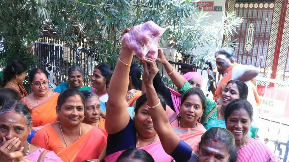 Women party workers received onions as gifts as part of Sonia Gandhi’s birthday celebration in Puducherry.