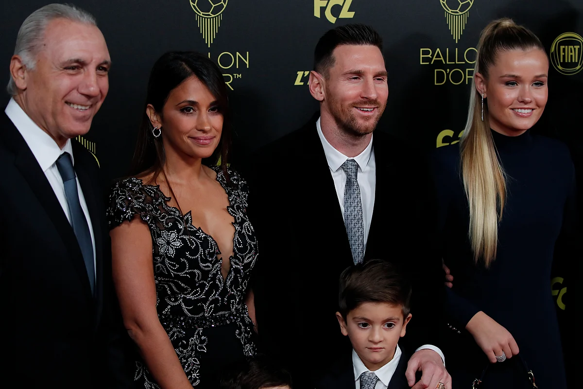 Barcelona’s Lionel Messi poses with his family during the Golden Ball award ceremony at the Grand Palais in Paris, Monday, Dec. 2, 2019. 