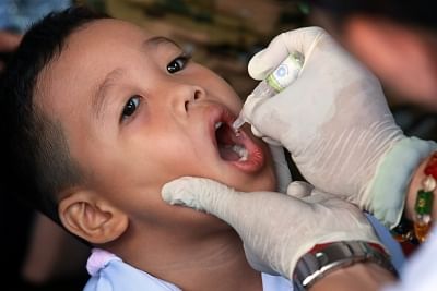 MANILA, Aug. 19, 2019 (Xinhua) -- A boy receives an oral poliovirus vaccine during an anti-polio campaign by the Philippine Department of Health in Manila, the Philippines, Aug. 19, 2019. (Xinhua/Rouelle Umali