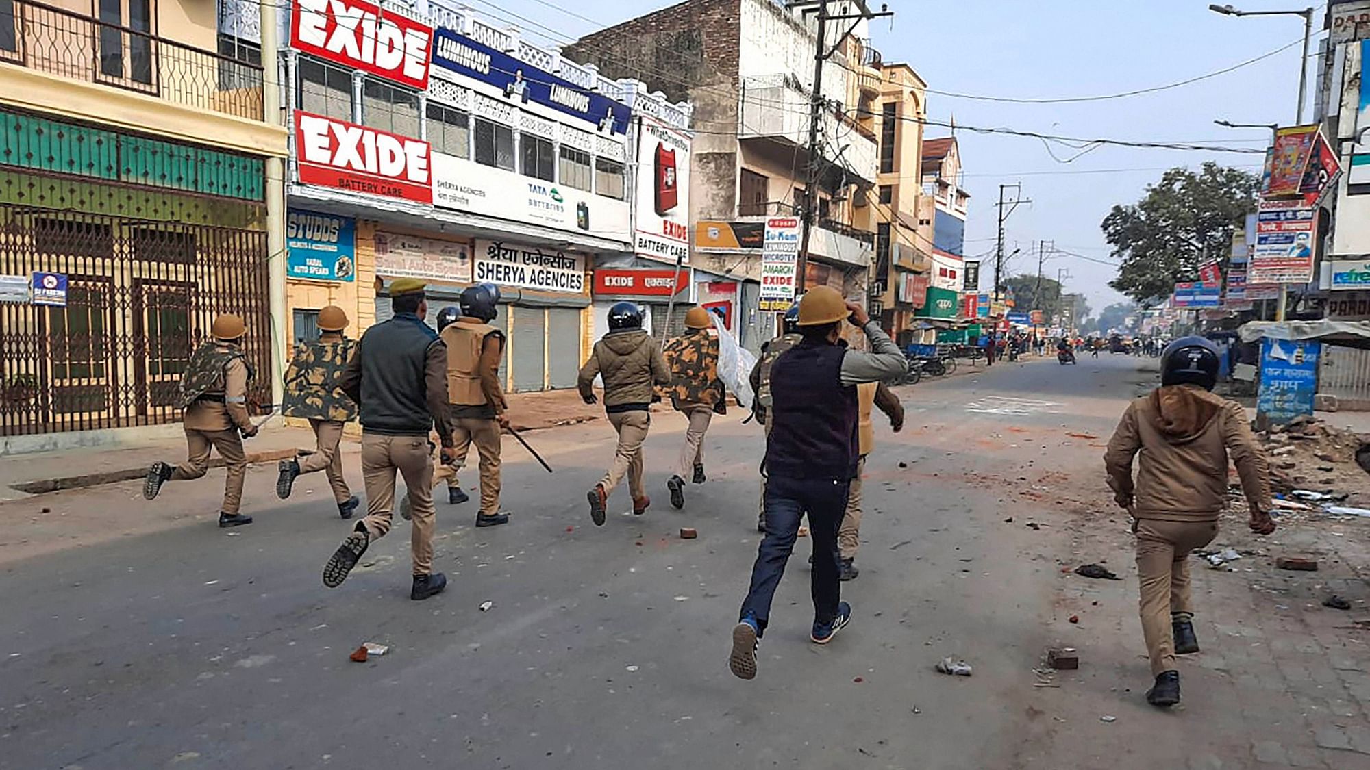 Police personnel clash with protesters during a rally against the Citizenship Amendment Act.