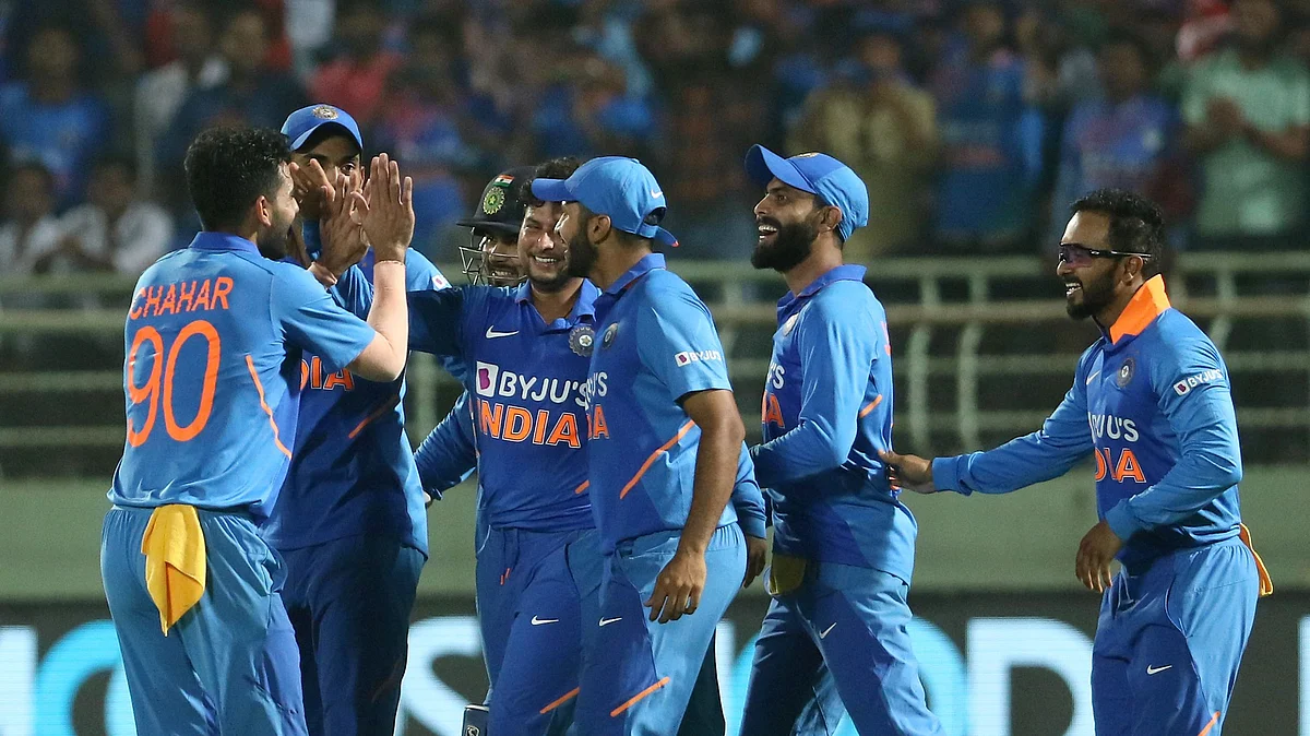 India players celebrate the wicket of Alzarri Joseph of West Indies and also the hat-trick of Kuldeep Yadav, during the 2nd ODI between India and the West Indies.
