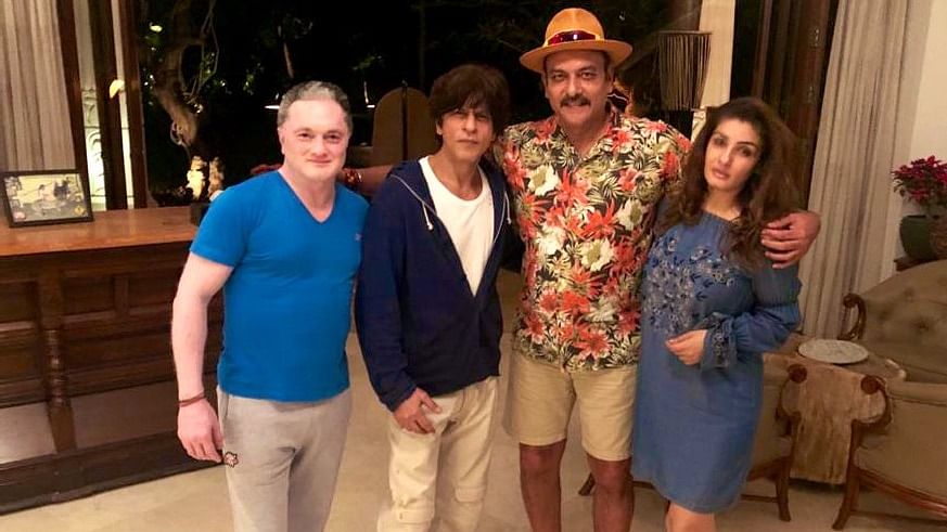 India cricket team head coach Ravi Shastri was spotted in a relaxed mood and spent the last few moments of the decade with Bollywood actors Shah Rukh Khan and Raveena Tandon in Alibag.