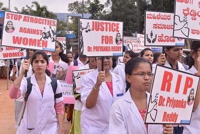 Bengaluru: Members of Pet Practitioners Association of Karnataka (PPAK), students of Veterinary College, Karnataka Veterinary Council (KVC) and Silicon city Kennel Club members stage a demonstration against the gruesome gang rape and murder of a woman veterinarian in Hyderabad; in Bengaluru on Dec 3, 2019. (Photo: IANS)
