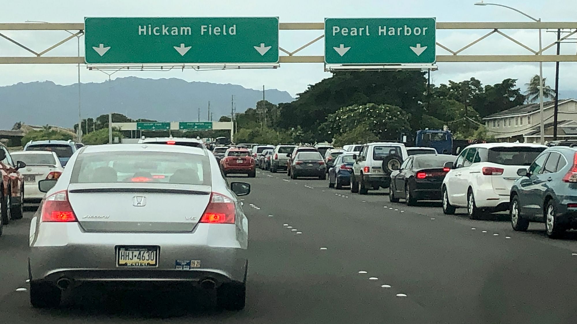 Traffic backs up at the main gates after a shooting at Pearl Harbor Naval shipyard on Wednesday.