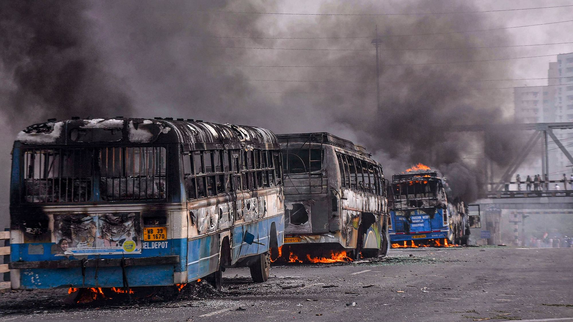 Vehicles torched by protestors agitating against the passing of Citizenship Amendment Act at Santragachi in Howrah district of West Bengal, Saturday, 14 December. 