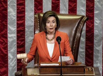 WASHINGTON, Oct. 31, 2019 (Xinhua) -- U.S. House Speaker Nancy Pelosi presides over a vote by the House of Representatives on a resolution formalizing an impeachment inquiry into President Donald Trump, on Capitol Hill in Washington D.C., the United States, on Oct. 31, 2019. The U.S. House of Representatives voted on Thursday to approve a resolution designed to formalize proceedings of an impeachment inquiry into President Donald Trump. (Melina Mara/Pool via Xinhua/IANS)