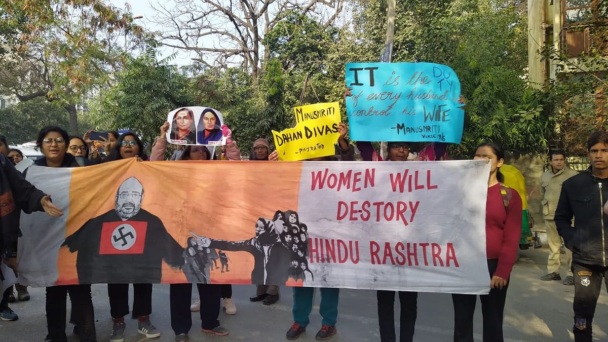 Protesters said CAA & NRC envision a divided India and are inspired by the Manusmriti.