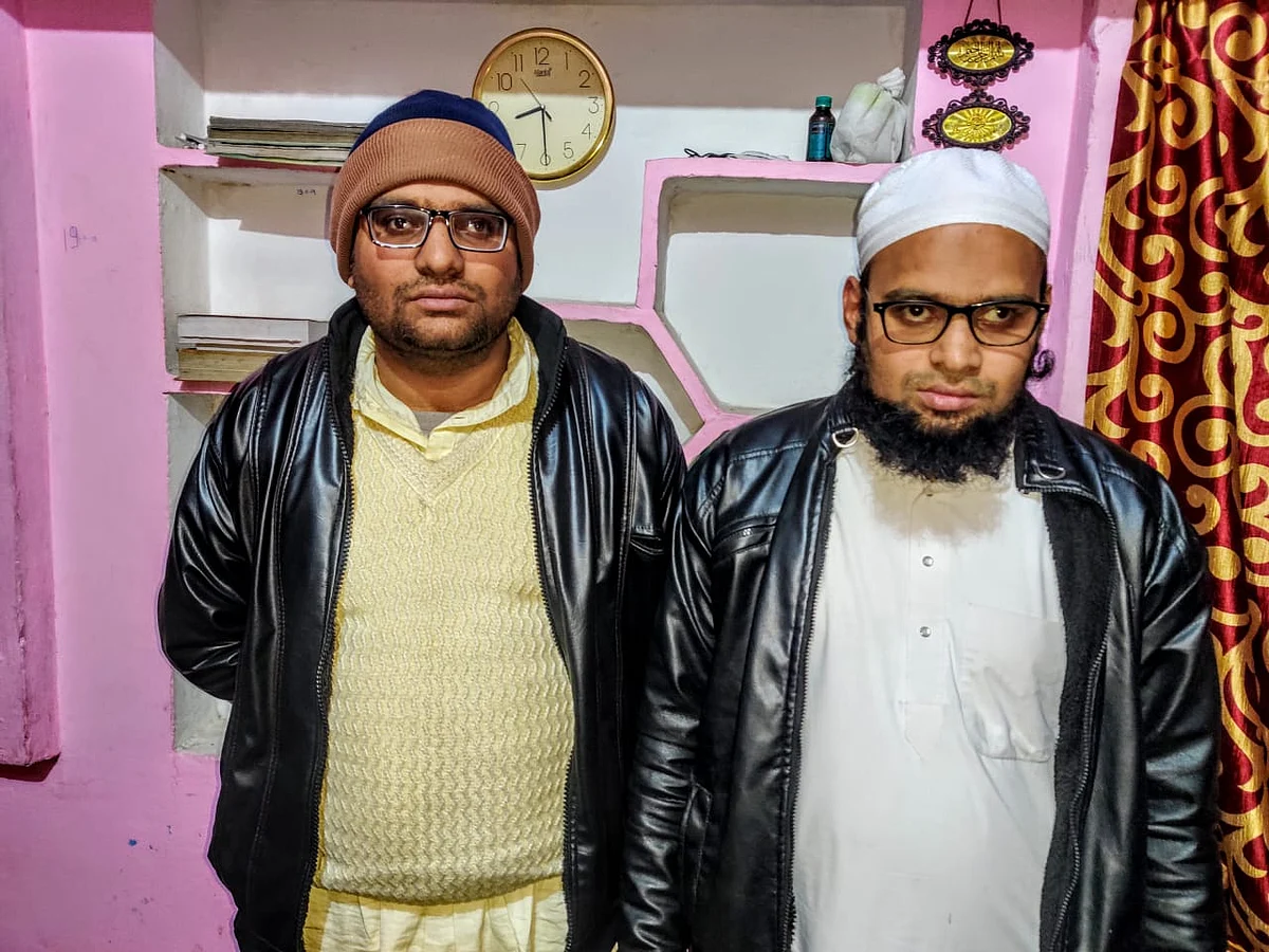 Suleiman’s two brothers, Shoaib Malik (left) and Maulana Salman (right).