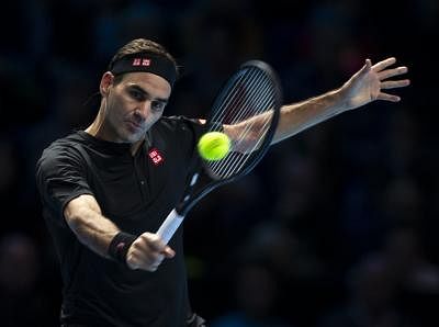 File: Roger Federer of Switzerland returns a shot during the singles match against Dominic Thiem&nbsp;