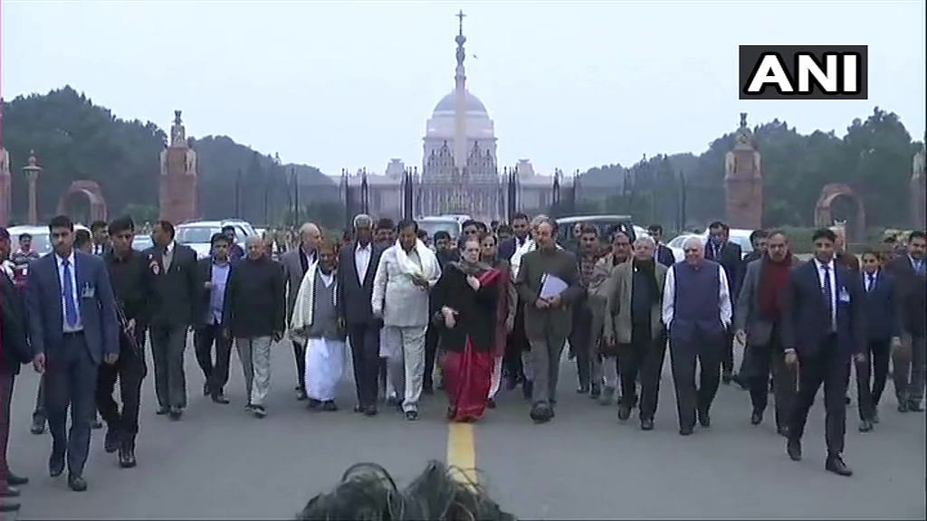 Interim Congress president Sonia Gandhi with the delegation of Opposition leaders at the Rashtrapati Bhavan.