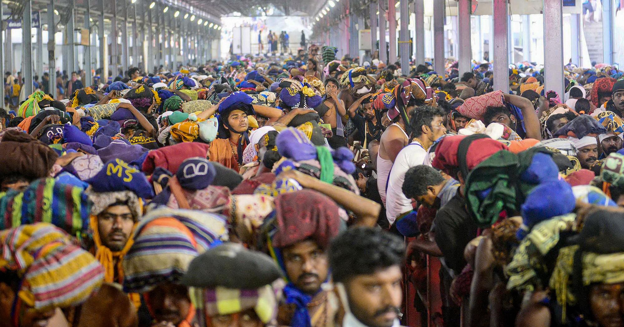  Devotees queue to offer prayers at Lord Ayyappa temple in Sabarimala on 24 December 2018. Image used for representation purposes only.