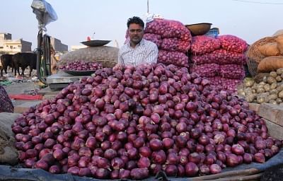 Amritsar: A vendor arranges onions at a wholesale market in Amritsar, on Dec 4, 2019. Onion prices across the country continue to soar. (Photo: IANS)