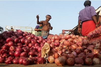 Chennai: Onions arrive at a wholesale market in Chennai on Dec 6, 2019. Onion prices have touched an all-time high with the vegetable being sold at Rs 140 a Kg in Chennai. (Photo: IANS)