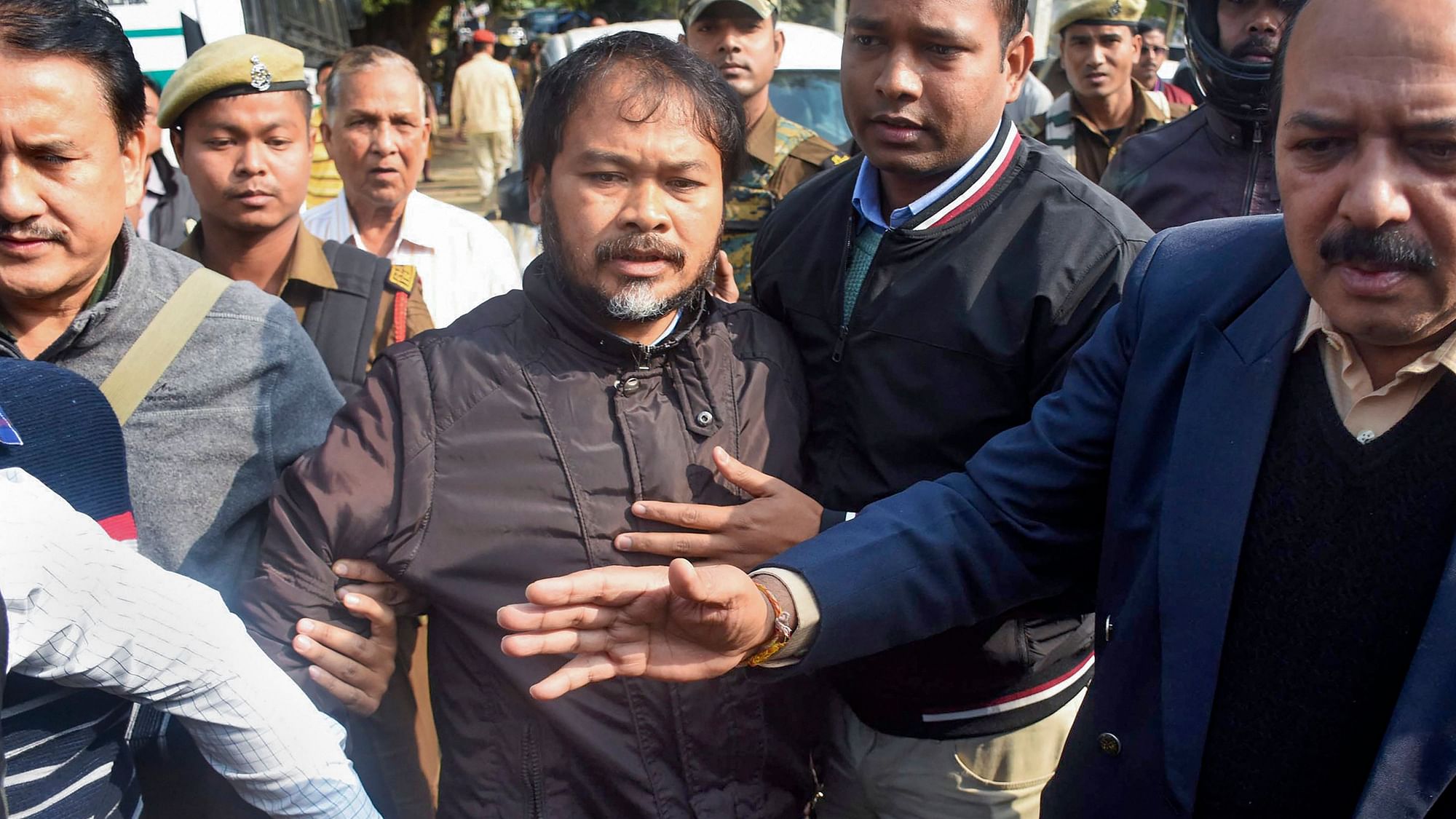Krishak Mukti Sangram Samiti (KMSS) advisor Akhil Gogoi being produced at an NIA court in Guwahati on 26 December.