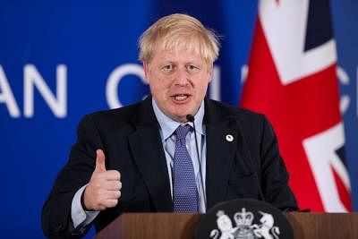 BRUSSELS, Oct. 17, 2019 (Xinhua) -- British Prime Minister Boris Johnson attends a press conference during an EU summit in Brussels, Belgium, on Oct. 17, 2019. The two-day summit kicked off on Thursday. The European Union (EU) and Britain have reached a new Brexit deal, President of the European Commission Jean-Claude Juncker said on Thursday. (Xinhua/Zheng Huansong/IANS)