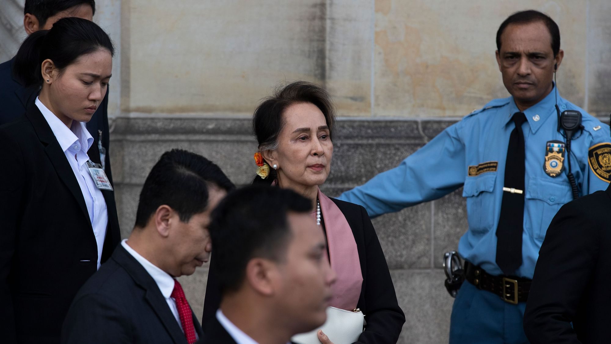 Aung San Suu Kyi leaves the International Court of Justice.