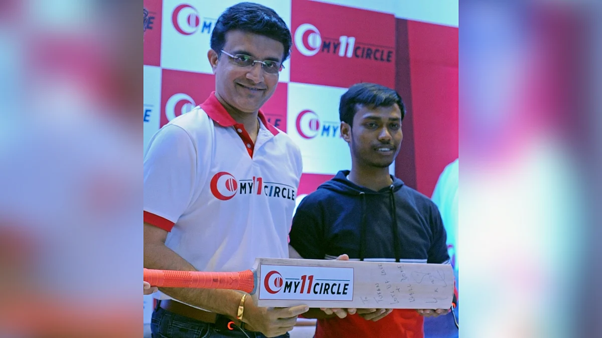 Sourav with Toofan Ghosh, the winner of the fantasy cricket league he endorses.
