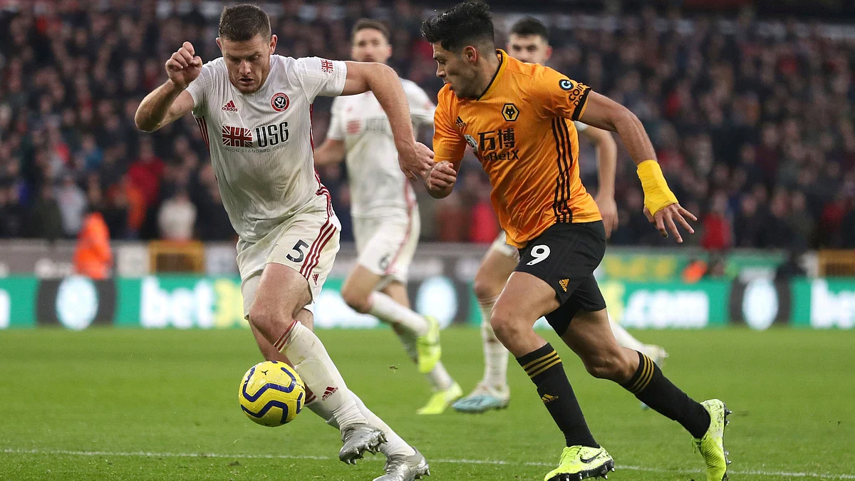 Sheffield United’s Jack O’Connell (left) and Wolverhampton Wanderers’s Raul Jimenez battle for the ball during the English Premier League match at Molineux, Wolverhampton, England.