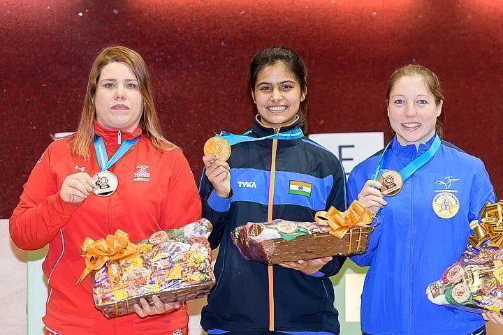 Manu Bhaker stands with her gold medal after beating a power-packed field at the 2018 ISSF World Cup.