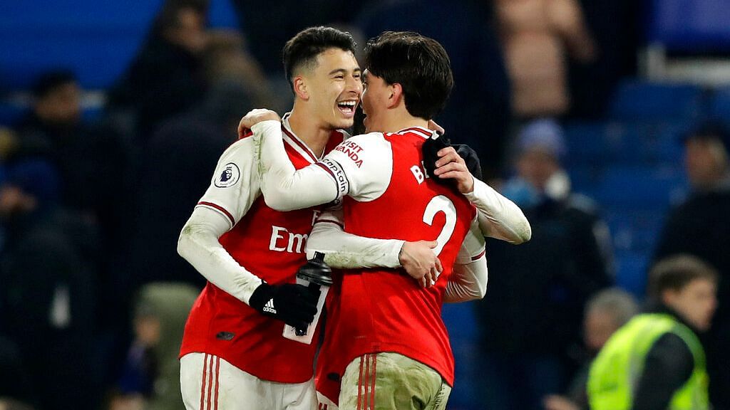 Gabriel Martinelli (left) and Hector Bellerin scored for Arsenal as the Gunners drew 2-2 against Chelsea at Stamford Bridge Stadium in London.&nbsp;