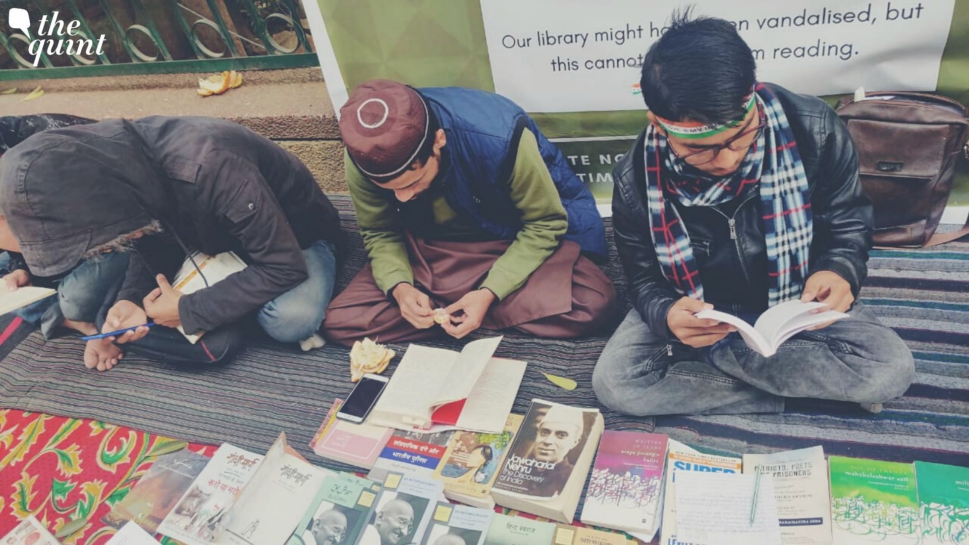 Days after Jamia’s library was vandalised in police action, students open one on the streets, pledge to ‘Read for Revolution.’