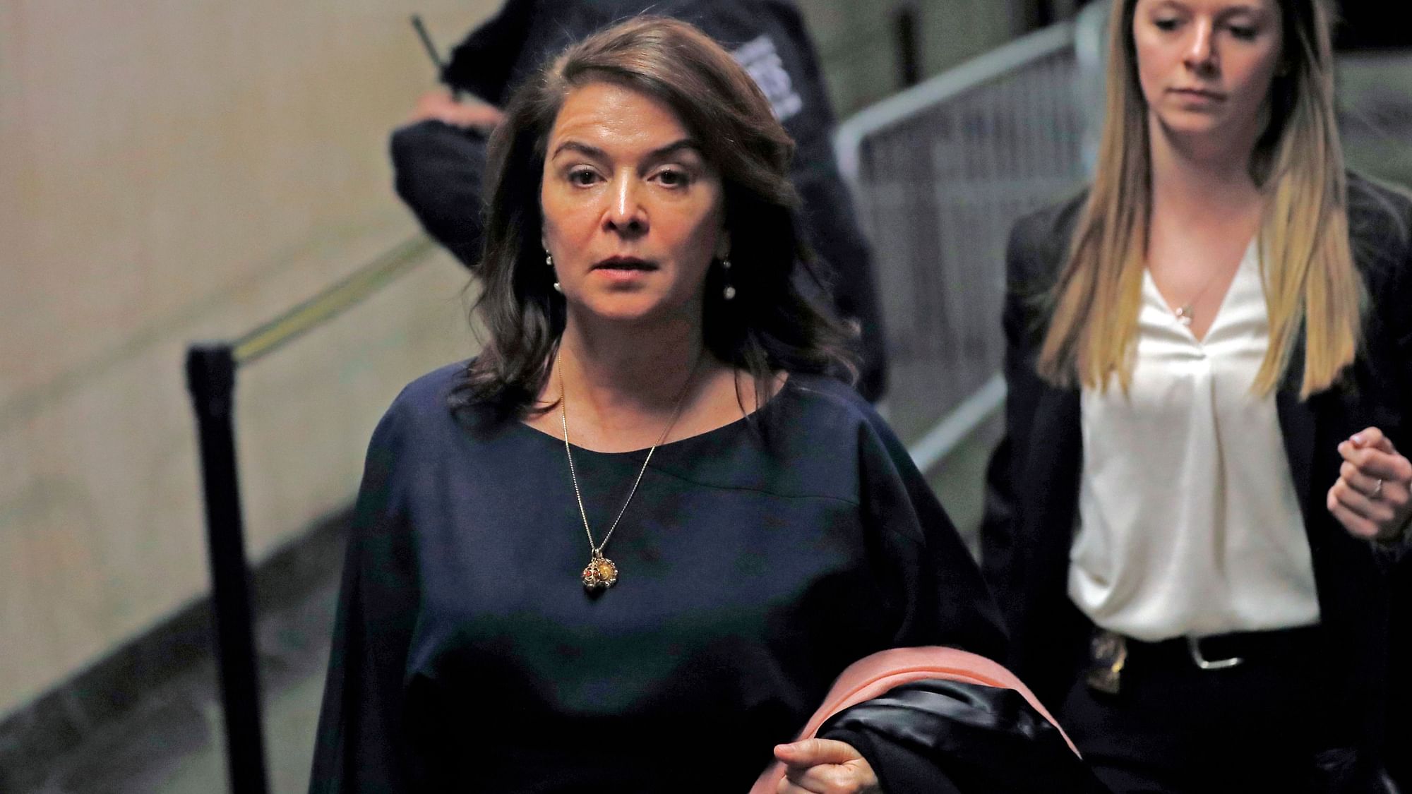 Actress Annabella Sciorra, left, leaves Manhattan Criminal Court after appearing at Harvey Weinstein’s rape and sexual assault trial, Thursday, 23 January 2020, in New York.