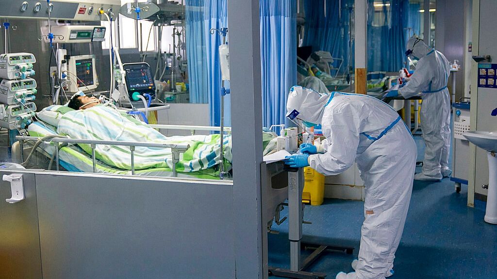 In this Friday, Jan. 24, 2020, photo released by China’s Xinhua News Agency, a medical worker attends to a patient in the intensive care unit at Zhongnan Hospital of Wuhan University in Wuhan in central China’s Hubei Province.&nbsp;